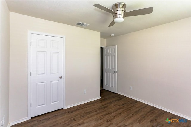 1321 Cozy Creek Dr, Temple, TX 76502 - unfurnished bedroom with dark wood-style flooring and ceiling fan