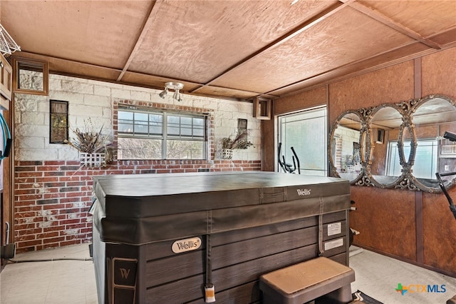 interior space with brick wall