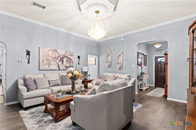 living room with visible vents, baseboards, arched walkways, a chandelier, and dark wood-type flooring