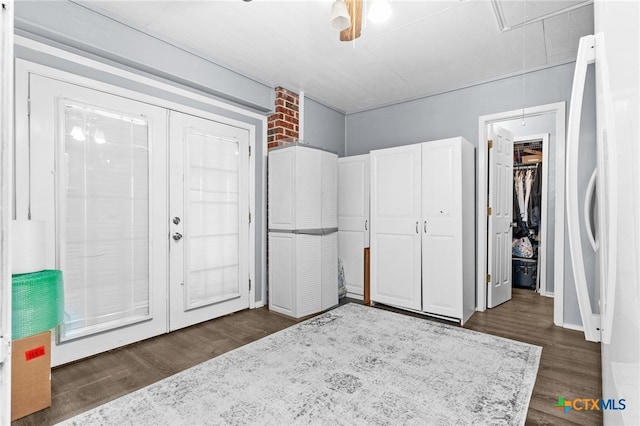 entrance foyer featuring dark wood-style flooring and french doors