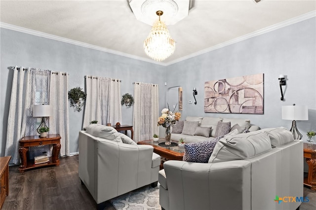 living room with a chandelier, ornamental molding, and wood finished floors