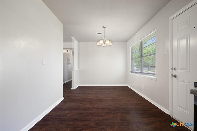 716 S 3rd St, Copperas Cove, TX 76522 - unfurnished dining area with a chandelier and wood finished floors