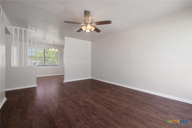 716 S 3rd St, Copperas Cove, TX 76522 - empty room featuring a chandelier, ceiling fan, and dark wood-style floors