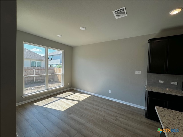 interior space with a healthy amount of sunlight and light hardwood / wood-style flooring