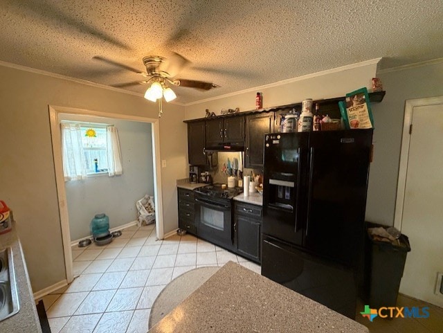 410 Phoenix Dr, Temple, TX 76504 - kitchen featuring black fridge, stove, a ceiling fan, ornamental molding, and under cabinet range hood