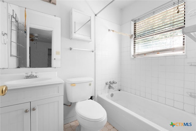 1202 S 3rd St, Copperas Cove, TX 76522 - bathroom with shower / bathtub combination, vanity, ceiling fan, and tile patterned flooring