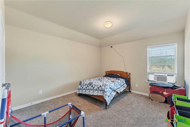 bedroom with carpet floors and cooling unit