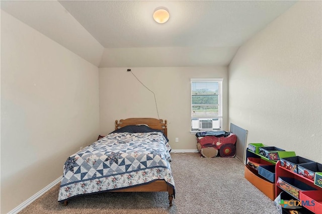 carpeted bedroom featuring cooling unit and vaulted ceiling