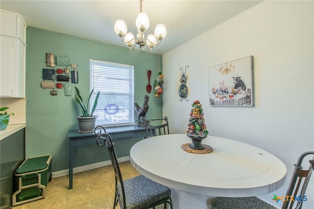1105 E Robertson Ave, Copperas Cove, TX 76522 - dining area featuring a chandelier and baseboards