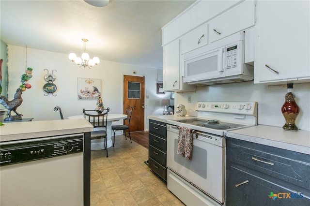 1105 E Robertson Ave, Copperas Cove, TX 76522 - kitchen with white appliances, light countertops, white cabinets, and a chandelier