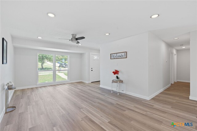 711 Santa Rosa Dr, Killeen, TX 76541 - unfurnished living room with recessed lighting, light wood finished floors, and a ceiling fan