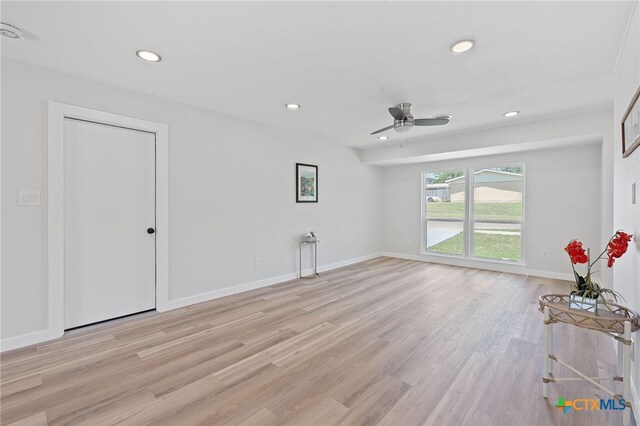 711 Santa Rosa Dr, Killeen, TX 76541 - unfurnished living room featuring a ceiling fan, recessed lighting, and light wood finished floors