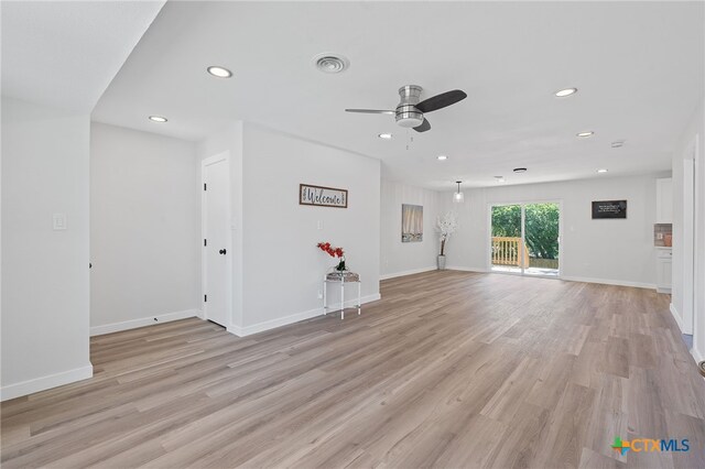 711 Santa Rosa Dr, Killeen, TX 76541 - unfurnished living room featuring ceiling fan, recessed lighting, and light wood-style flooring