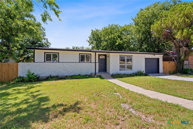 711 Santa Rosa Dr, Killeen, TX 76541 - view of front of house featuring driveway and an attached garage