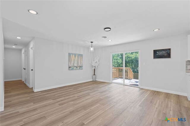 711 Santa Rosa Dr, Killeen, TX 76541 - unfurnished living room featuring light wood finished floors and recessed lighting