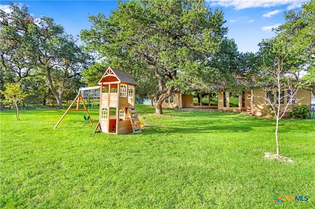 view of yard featuring a playground