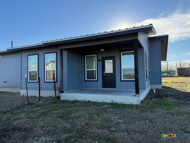 back of house featuring a patio area