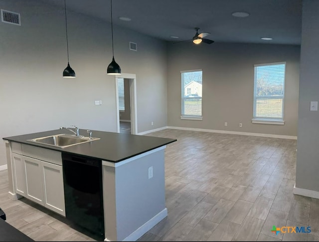 kitchen with sink, decorative light fixtures, a center island with sink, black dishwasher, and white cabinetry