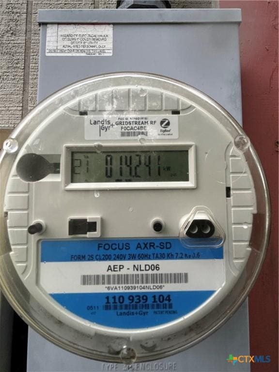 exterior details featuring electric meter