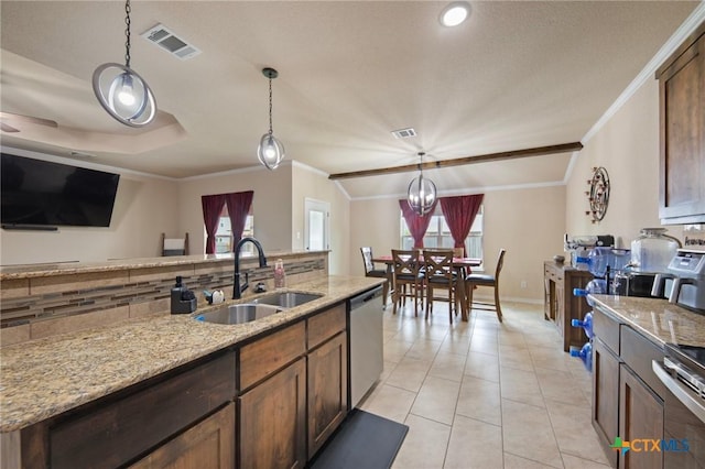 6105 Dorado Dr, Killeen, TX 76542 - kitchen with a sink, ornamental molding, stainless steel appliances, plenty of natural light, and hanging light fixtures