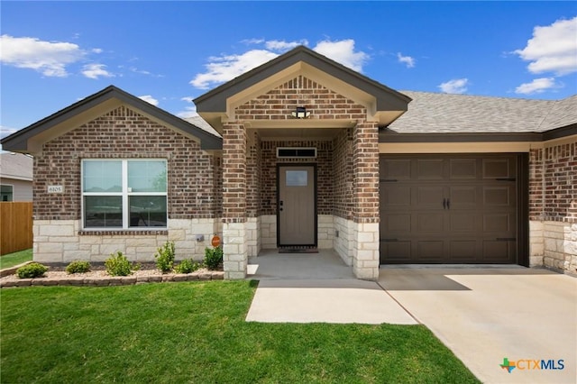 6105 Dorado Dr, Killeen, TX 76542 - single story home featuring an attached garage, concrete driveway, brick siding, and stone siding