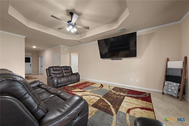 6105 Dorado Dr, Killeen, TX 76542 - living area featuring a tray ceiling, baseboards, a ceiling fan, and visible vents