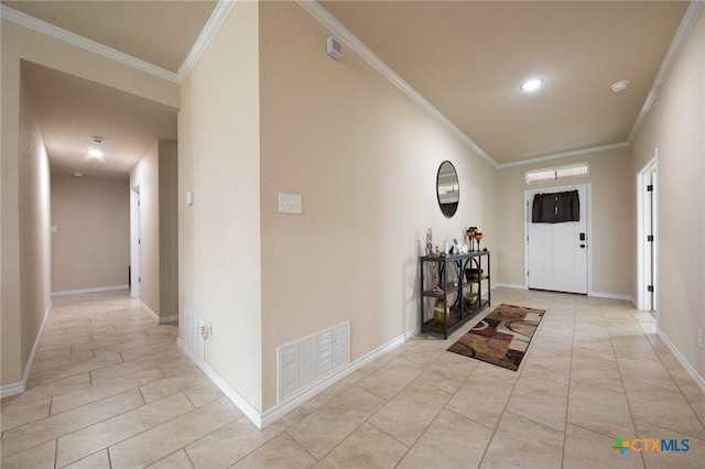 6105 Dorado Dr, Killeen, TX 76542 - entrance foyer featuring ornamental molding, light tile patterned flooring, baseboards, and visible vents