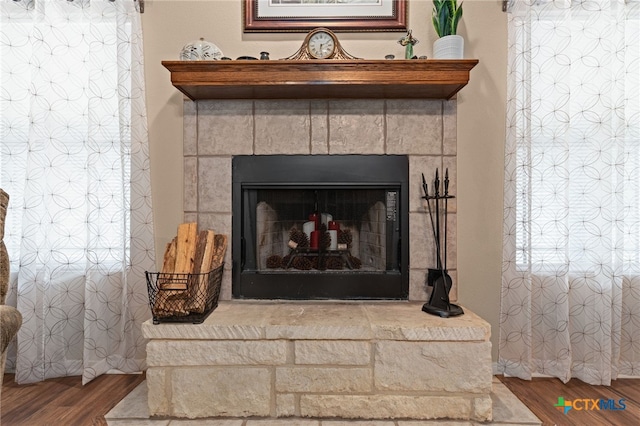 1712 Indian Camp Trl, Copperas Cove, TX 76522 - detailed view of wood finished floors and a tiled fireplace