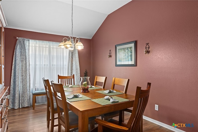 1712 Indian Camp Trl, Copperas Cove, TX 76522 - dining area featuring vaulted ceiling, a chandelier, and wood finished floors