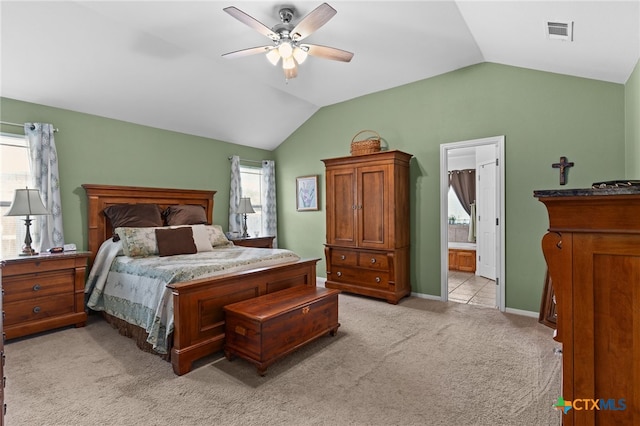 1712 Indian Camp Trl, Copperas Cove, TX 76522 - bedroom featuring lofted ceiling, light carpet, connected bathroom, and a ceiling fan