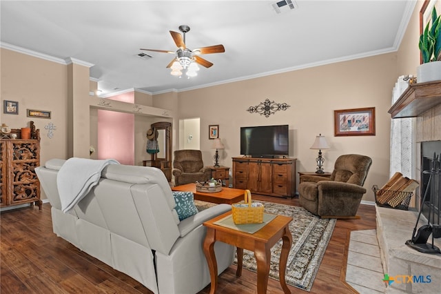 1712 Indian Camp Trl, Copperas Cove, TX 76522 - living room with ornamental molding, ceiling fan, and wood finished floors
