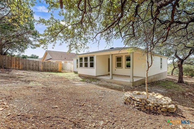 rear view of house with a patio area