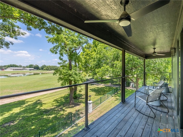 3415 Chisholm Trl, Salado, TX 76571 - wooden deck with a yard, ceiling fan, and a water view