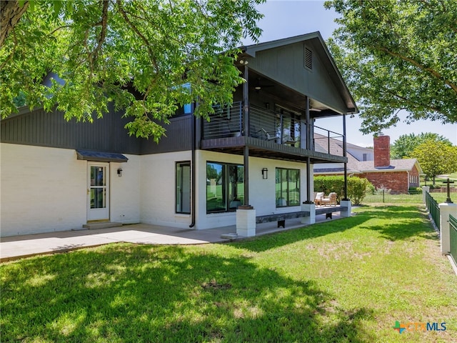 3415 Chisholm Trl, Salado, TX 76571 - rear view of house with a patio area, fence, a lawn, and a balcony