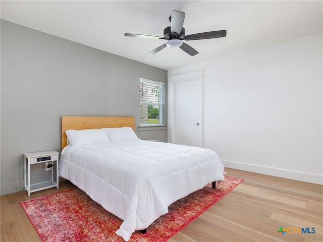 3415 Chisholm Trl, Salado, TX 76571 - bedroom featuring wood finished floors, baseboards, and ceiling fan