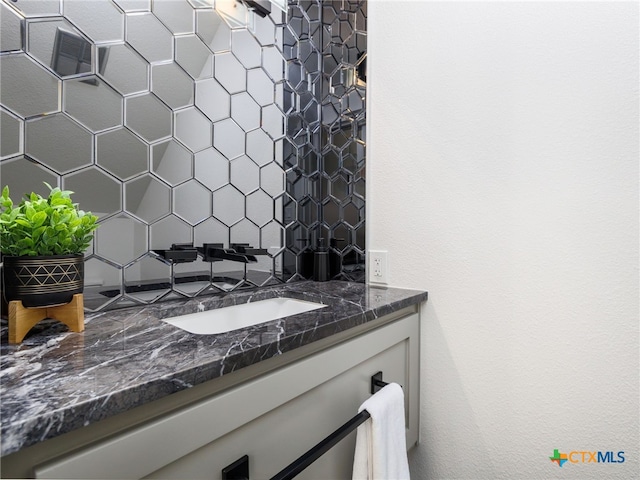 3415 Chisholm Trl, Salado, TX 76571 - bathroom with vanity and decorative backsplash