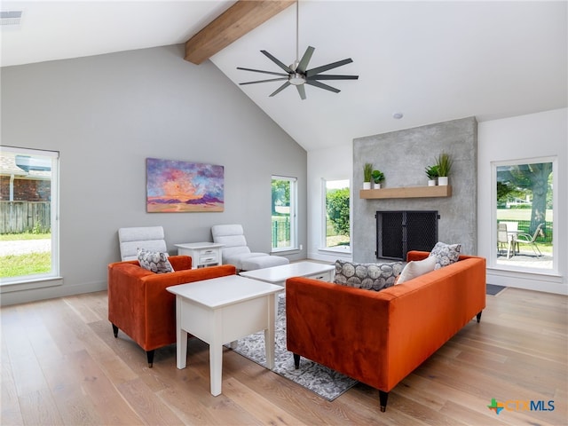 3415 Chisholm Trl, Salado, TX 76571 - living room featuring a wealth of natural light, light wood-style flooring, beam ceiling, and ceiling fan
