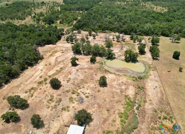 930 Elm Creek Rd, Rockdale, TX 76567 - drone / aerial view of a heavily wooded area