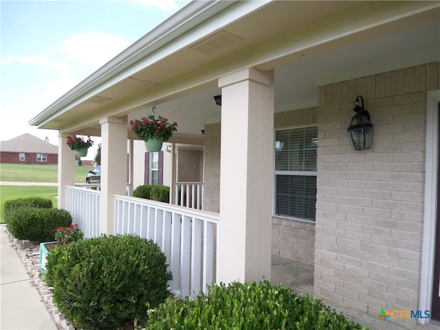 view of home's exterior featuring a porch