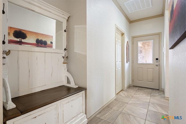 mudroom featuring ornamental molding