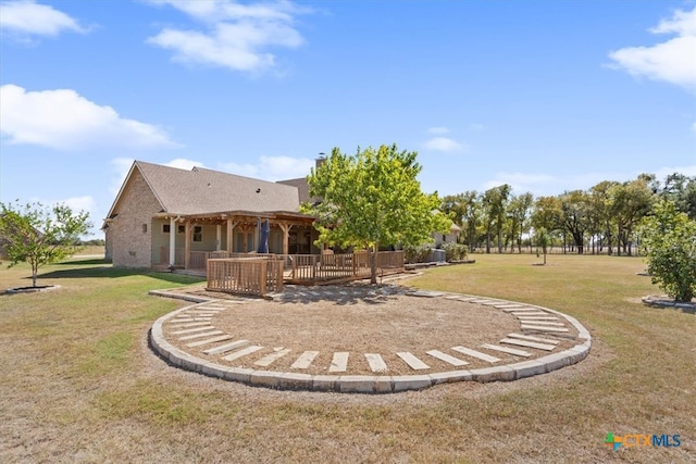 back of house with a yard