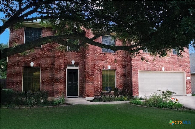 7016 Albacete Ln, Round Rock, TX 78681 - view of front facade with a garage, a front yard, driveway, and brick siding