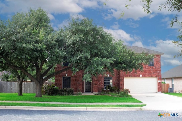 7016 Albacete Ln, Round Rock, TX 78681 - view of property hidden behind natural elements with brick siding, a garage, and concrete driveway