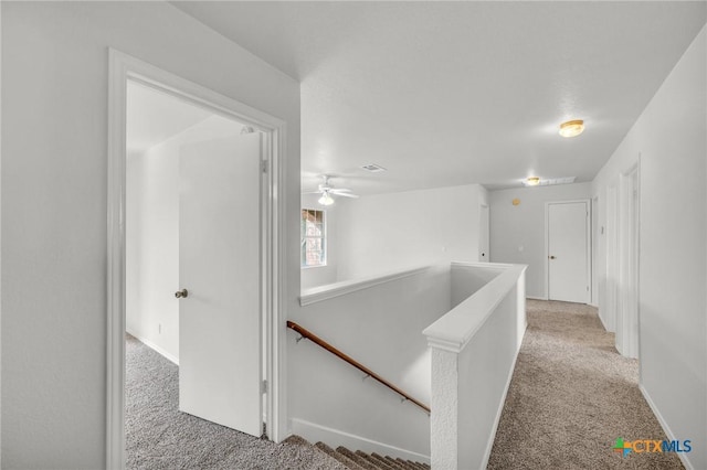 7016 Albacete Ln, Round Rock, TX 78681 - hall featuring an upstairs landing and carpet floors