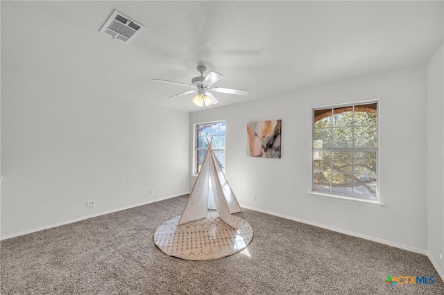 7016 Albacete Ln, Round Rock, TX 78681 - carpeted spare room with healthy amount of natural light and a ceiling fan