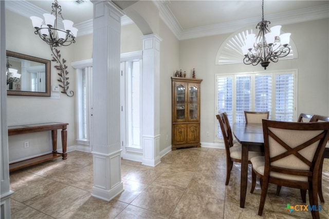 dining area featuring a healthy amount of sunlight, an inviting chandelier, arched walkways, and ornate columns