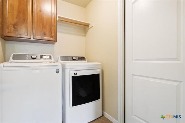 3425 Doss St, Copperas Cove, TX 76522 - laundry room featuring separate washer and dryer and cabinet space