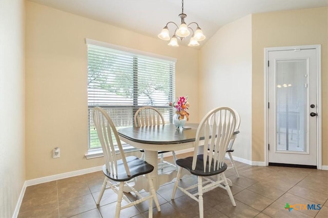 3425 Doss St, Copperas Cove, TX 76522 - dining room featuring tile patterned flooring, a chandelier, and vaulted ceiling
