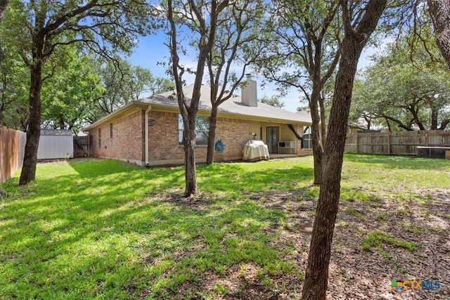 3425 Doss St, Copperas Cove, TX 76522 - fenced backyard with a shed
