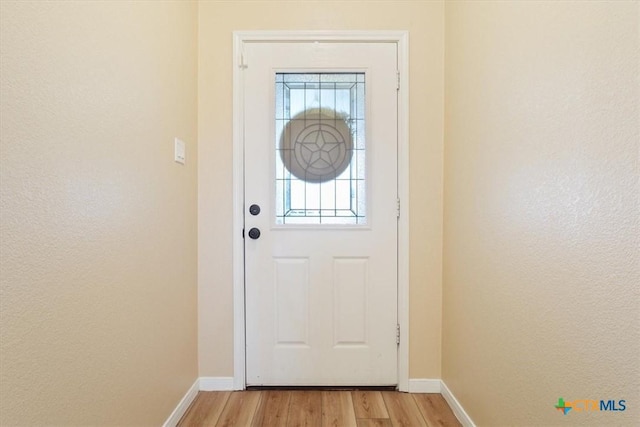 3425 Doss St, Copperas Cove, TX 76522 - doorway with light wood-type flooring and baseboards